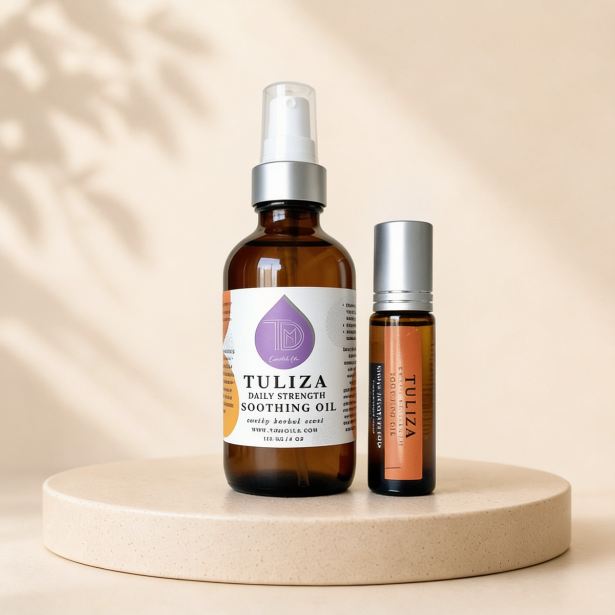 Tuliza Recovery Duo — roll-on and body oil together on linen surface. Warm flat lay. Cream or tan background. Can include collarbone/chest application shot.